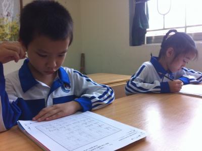 Gia sư cần dạy trẻ kĩ năng trình bày bài kiểm tra